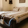 Alternating pressure air mattress set up on a home bed for bed sore prevention
